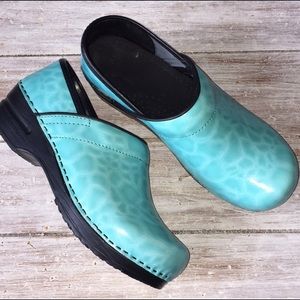 Teal Sanita clogs